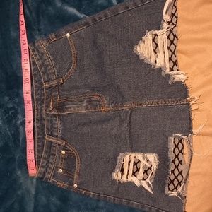 Distressed denim skirt